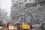 Tuyết rơi lần đầu tiên ở thành phố Trùng Khánh, miền tây nam Trung Quốc ngày 23/1. (Ảnh: THX/ TTXVN)