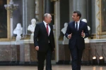 Tổng thống Nga Vladimir Putin và người đồng cấp Pháp Emmanuel Macron. (Nguồn: Getty Images)