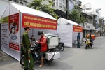 Hà Nội tăng cường kiểm soát người tham gia giao thông tại nhiều tuyến phố. (Ảnh: Trần Việt/TTXVN)