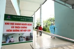 Bệnh viện K phân luồng, chuyển sang khu vực khám sàng lọc riêng. (Ảnh: Minh Quyết/TTXVN)