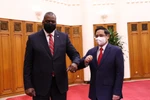 Thủ tướng Phạm Minh Chính tiếp Bộ trưởng Quốc phòng Hợp chúng quốc Hoa Kỳ Lloyd Austin. (Ảnh: Dương Giang/TTXVN)