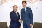 Thủ tướng Nguyễn Xuân Phúc gặp Thủ tướng Canada Justin Trudeau. (Ảnh: Thống Nhất/TTXVN)