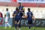 Các cầu thủ Nhật Bản ăn mừng bàn thắng trước đội tuyển Saudi Arabia. (Ảnh: Hoàng Linh/TTXVN)