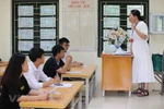 Thí sinh dự thi Trung học phổ thông quốc gia 2019. (Ảnh: Phạm Mai/Vietnam+)