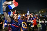 Cổ động viên đội tuyển Pháp tại Doha, Qatar. (Ảnh: AFP/TTXVN)