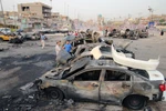 Hiện trường một vụ đánh bom xe ở thủ đô Baghdad. (Nguồn: AFP/TTXVN)