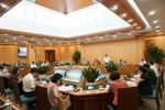 Ban Chỉ đạo phòng chống dịch COVID-19 thành phố Hà Nội họp trực tuyến với các quận, huyện. (Ảnh: PV/Vietnam+)