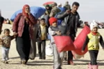 Người tị nạn Syria mắc kẹt tại khu vực biên giới Jordan. (Nguồn: AFP/TTXVN) 