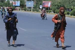 Quân Taliban bắt đầu tiến vào thủ đô của Afghanistan từ mọi ngả