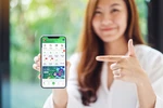 Nhiều người trẻ đã chọn gửi tiết kiệm trên ứng dụng VPBank NEO. (Ảnh: Vietnam+)