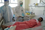 Bệnh nhân Trần Văn An đã ổn định sức khỏe sau 10 ngày được các bác sỹ Bệnh viện Hồi sức COVID-19 điều trị tích cực do Bệnh viện Chợ Rẫy phụ trách chính, từ một tin nhắn cầu cứu trên fanpage Bệnh viện. (Ảnh: TTXVN phát)