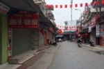 Đường phố trên địa bàn phường Sao Đỏ, thành phố Chí Linh vắng lặng trong sáng 29/1. (Ảnh: TTXVN phát)