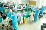 Tiêm vaccine phòng COVID-19 cho công nhân Công ty Piaggio Việt Nam tại Vĩnh Phúc. (Ảnh: Hoàng Hùng/TTXVN)