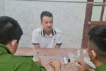 Đối tượng Lâm Đức Anh tại cơ quan điều tra. (Ảnh: TTXVN phát)
