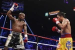 Trận "so găng thế kỷ" Mayweather-Pacquiao đạt doanh thu khổng lồ