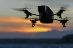 Chiếc UAV mang theo 2 quả lựu đạn và một camera thu hình cỡ nhỏ (Nguồn: Sputnik)