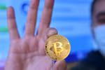 Đồng tiền kỹ thuật số bitcoin. (Nguồn: AFP/TTXVN) 