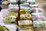 Quá trình phá án, Công an đã thu gần 50kg ma túy cùng với súng và lựu đạn. (Nguồn: Báo Đồng Nai) 