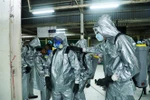 Phun thuốc khử trùng nhằm ngăn chặn sự lây lan của dịch COVID-19 tại Bangkok, Thái Lan ngày 24/3/2020. (Nguồn: AFP/TTXVN) 