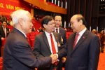 Ông Nguyễn Xuân Phúc, Ủy viên Bộ Chính trị, Thủ tướng Chính phủ, với các đại biểu tại Đại hội. (Nguồn: TTXVN) 