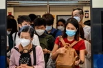 Người dân đeo khẩu trang phòng tránh lây nhiễm virus corona tại Bangkok, Thai Lan, ngày 27/1/2020. (Nguồn: AFP/TTXVN) 