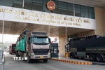 Hoạt động xuất nhập khẩu hàng hóa qua Cửa khẩu Quốc tế đường bộ số 2 Kim Thành, tỉnh Lào Cai. (Nguồn: TTXVN)