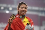 Vận động viên Bùi Thị Thu Thảo của Việt Nam giành huy chương vàng nội dung nhảy xa nữ tại ASIAD 2018, Jakarta, Indonesia ngày 27/8. (Nguồn: AFP/TTXVN)