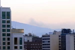 Khói bốc lên tại thủ đô Damascus sau đợt tấn công của liên quân Mỹ- Anh- Pháp nhằm vào Syria ngày 14/4. (Nguồn: THX/ TTXVN) 