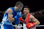 Nguyễn Văn Đương chia tay Olympic Tokyo 2020 với một chiến thắng đầu tiên trước tay đấm người Azerbaijan. (Ảnh: Getty Images) 