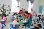 Giờ học tại cơ sở Mầm non Búp Sen xanh, thành phố Vinh. (Ảnh: Bích Huệ/TTXVN)