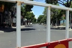 Tuyến đường Quang Trung được ngăn rào chắn phong tỏa để phục vụ công tác phòng, chống dịch COVID-19 tại Đà Nẵng. (Ảnh: Trần Lê Lâm/TTXVN)