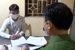 Đối tượng Đoàn Quốc Được (xã Hoàng Nam, huyện Nghĩa Hưng, tỉnh Nam Định) tại cơ quan Công an. (Ảnh: TTXVN)