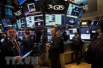 Giao dịch viên tại Sàn giao dịch chứng khoán New York, Mỹ. (Ảnh: THX/TTXVN)
