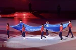 Lễ rước cờ của liên đoàn thể thao Đông Nam Á tại buổi tổng duyệt Lễ khai mạc SEA Games 31. (Ảnh: Quang Hà/TTXVN)