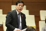 Bộ trưởng Bộ Thông tin và Truyền thông Nguyễn Bắc Son trả lời chất vấn của đại biểu Quốc hội. (Ảnh: Phương Hoa/TTXVN)