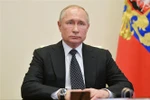 Tổng thống Nga Vladimir Putin trong cuộc họp trực tuyến với Hội đồng An ninh về lễ kỷ niệm 75 năm Ngày Chiến thắng phátxít, chấm dứt Thế chiến II ở ngoại ô Moskva, ngày 16/4/2020. (Ảnh: THX/TTXVN)