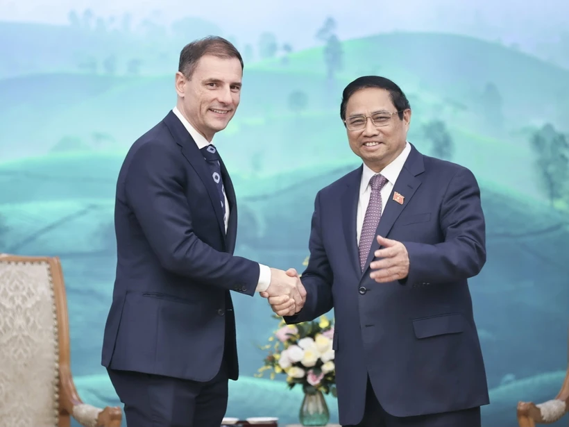 Thủ tướng Phạm Minh Chính tiếp Bộ trưởng Bộ Tư pháp Hungary Tuzson Bence. (Ảnh: Dương Giang/TTXVN)