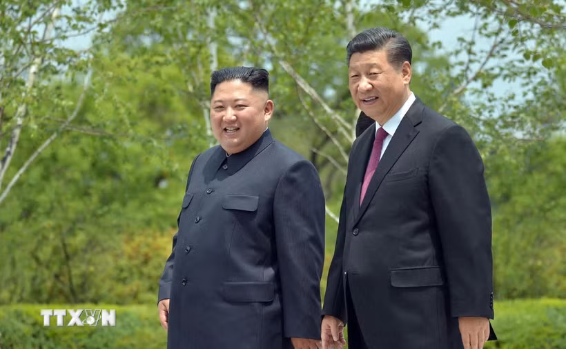 Tổng Bí thư, Chủ tịch Trung Quốc Tập Cận Bình và nhà lãnh đạo Triều Tiên Kim Jong Un. (Nguồn: TTXVN)