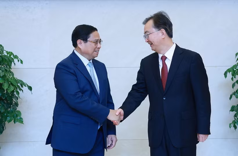 Thủ tướng Phạm Minh Chính gặp Bí thư Tỉnh ủy Vân Nam Vương Ninh. (Ảnh: Dương Giang/TTXVN)