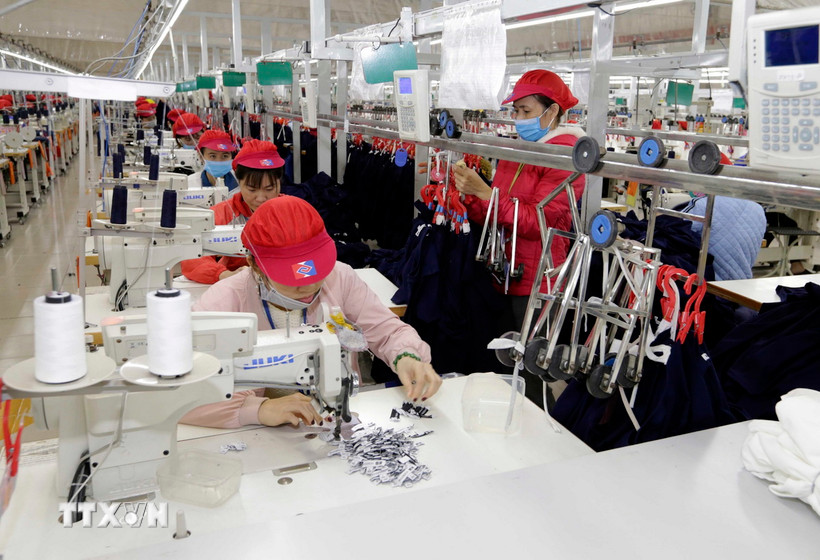 Sản xuất hàng dệt may xuất khẩu. (Ảnh minh họa. Nguồn: TTXVN)