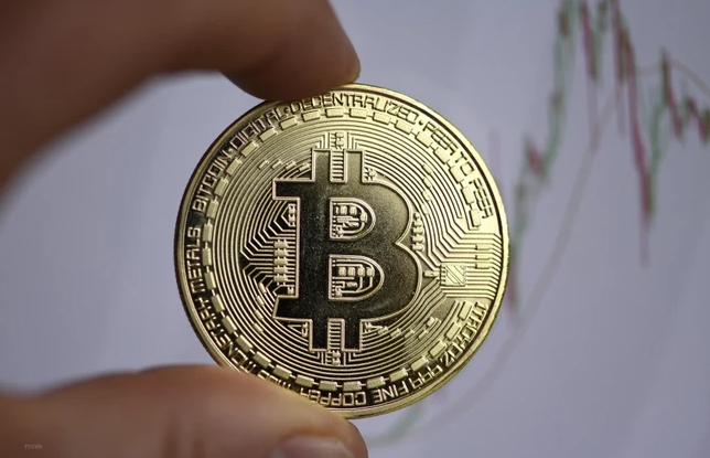 Đồng tiền kỹ thuật số Bitcoin. (Ảnh: AFP/TTXVN) 