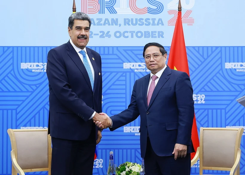 Thủ tướng Phạm Minh Chính gặp Tổng thống Venezuela Nicolas Maduro. (Ảnh: Dương Giang/TTXVN)