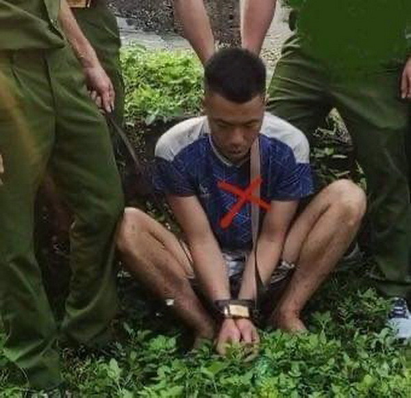 Phạm nhân Mai Văn Đệ bị bắt giữ. (Ảnh: TTXVN phát)