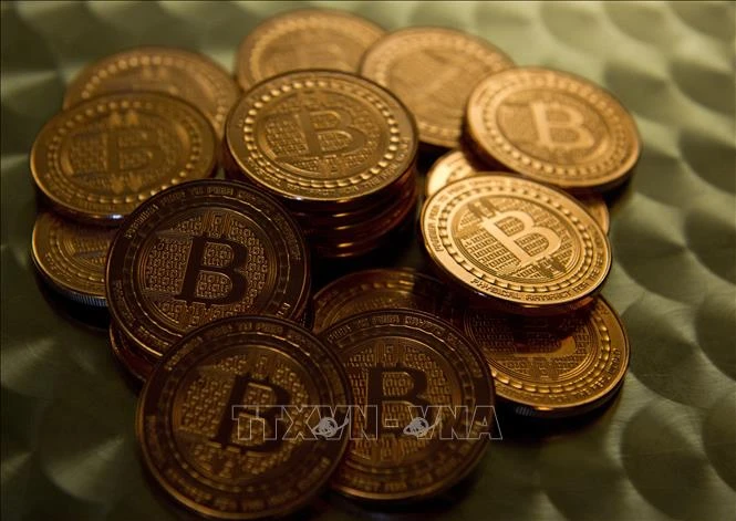 Đồng tiền điện tử bitcoin . (Ảnh: AFP/TTXVN) 