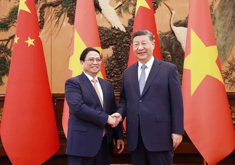 Thủ tướng Phạm Minh Chính hội kiến Tổng Bí thư, Chủ tịch Trung Quốc Tập Cận Bình. (Ảnh: Dương Giang/TTXVN)