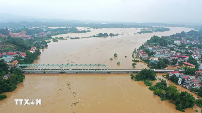 Đến chiều 9/9, nước lũ trên sông Hồng đoạn qua Yên Bái tiếp tục lên chậm. (Ảnh: Tuấn Anh/TTXVN)