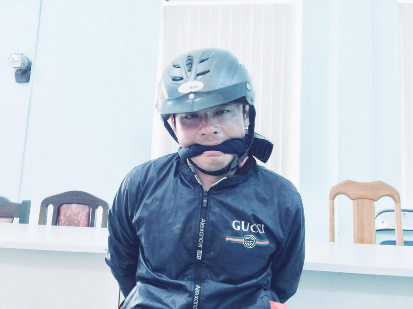 Nghi can Nguyễn Hoàng Nam tại Cơ quan Công an. (Ảnh: Thành Chung/TTXVN)