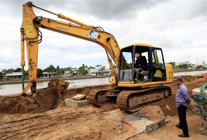 Thi công một dự án ở Cần Thơ. (Nguồn: TTXVN)