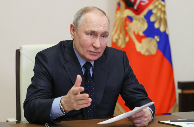Tổng thống Nga Vladimir Putin. (Ảnh: AFP/TTXVN) Ông Putin: Hệ thống tài chính phi tập trung có lợi cho KT toàn cầu ảnh 1