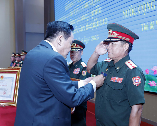 Việt Nam-Lào tăng cường hợp tác tìm kiếm, quy tập hài cốt liệt sỹ ảnh 2